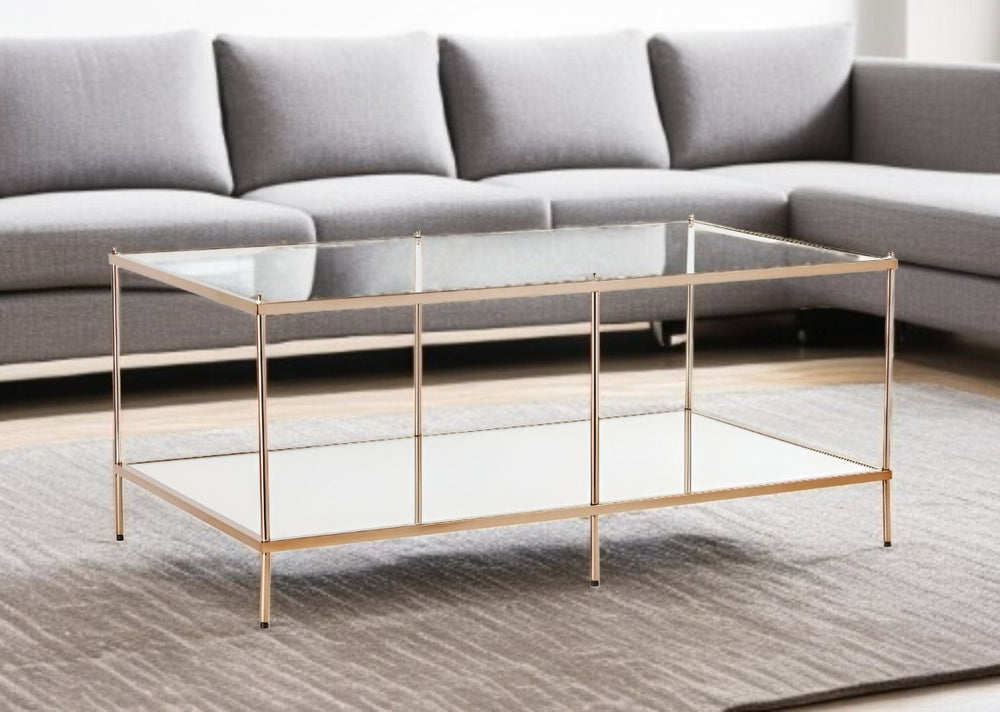 HomeRoots 42" Clear Tempered Glass & Gold Metal Coffee Table - Glamorous Art Deco Style for Modern Living Spaces 402101