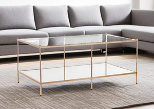 HomeRoots 42" Clear Tempered Glass & Gold Metal Coffee Table - Glamorous Art Deco Style for Modern Living Spaces 402101