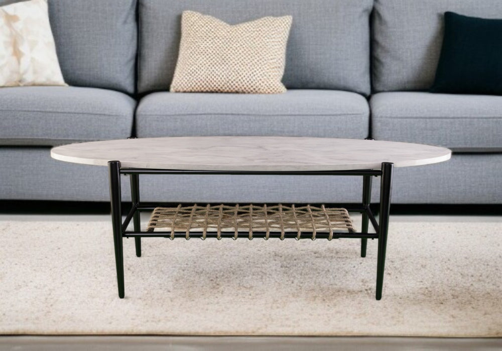 HomeRoots 52" Black and White Oval Faux Marble Coffee Table with Boho Rope Shelf for Modern Living Spaces 402116