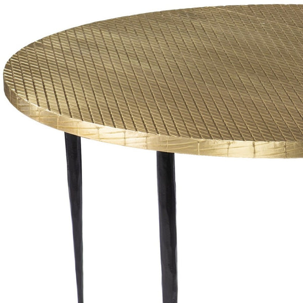 HomeRoots 34" Bold Black and Gold Embossed Round Coffee Table - Handcrafted Industrial Design for Modern Spaces 402118