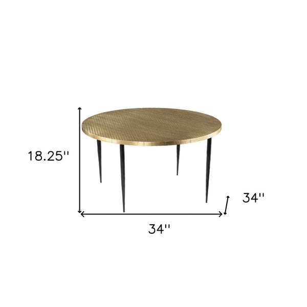 HomeRoots 34" Bold Black and Gold Embossed Round Coffee Table - Handcrafted Industrial Design for Modern Spaces 402118