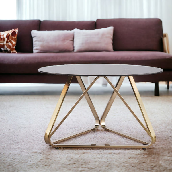 Homeroots 31" Champagne Glass And Metal Round Coffee Table   402129