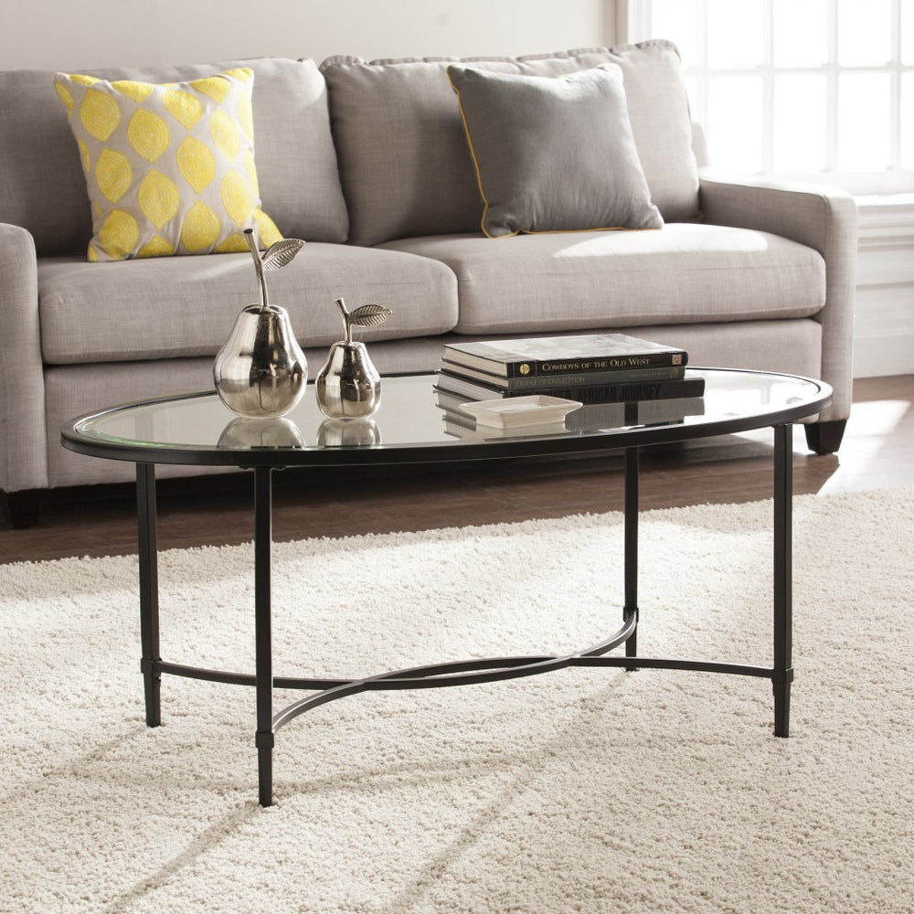 Homeroots 45" Black Glass And Metal With Iron Oval Coffee Table   402151