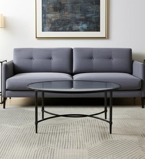 HomeRoots 45" Clear Oval Coffee Table with Black Metal Base - Modern Geometric Design for Any Room Decor 402151