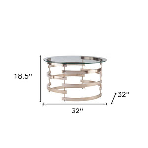 Homeroots 32" Clear And Champagne Glass And Metal With Iron Round Coffee Table   402155