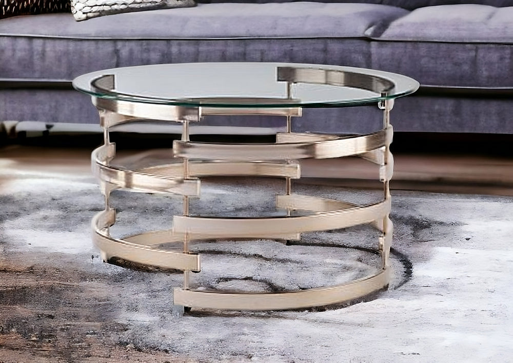 Homeroots 32" Clear And Champagne Glass And Metal With Iron Round Coffee Table   402155