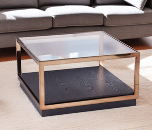 HomeRoots 33" Elegant Champagne Glass Top Coffee Table with Solid Wood Base and Stylish Lower Shelf Storage 402170