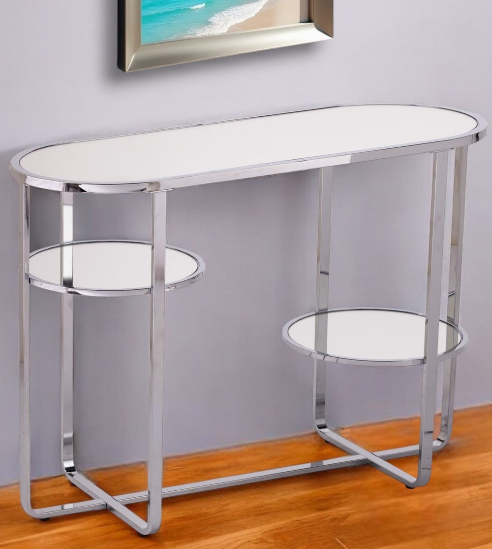 Homeroots 42" Silver Mirrored Glass Oval Cross Leg Console Table With Shelves   402388