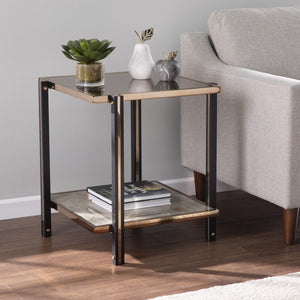 HomeRoots 24" Chic Champagne Glass End Table with Mirrored Surface & Shelf for Modern Living Spaces 402492