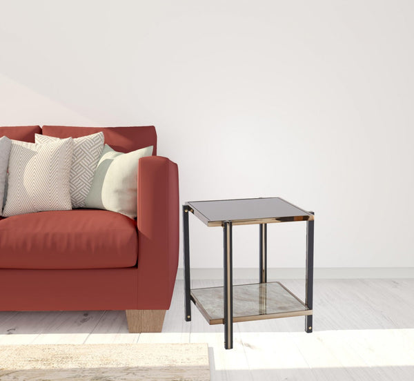 HomeRoots 24" Chic Champagne Glass End Table with Mirrored Surface & Shelf for Modern Living Spaces 402492