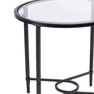Homeroots 25" Black And Clear Glass Oval End Table   402501