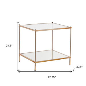 HomeRoots 22" Clear Glass and Gold Iron End Table with Mirrored Shelf - Modern Glam for Any Space! 402504