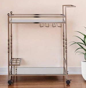 HomeRoots Champagne Metal Rolling Bar Cart with Mirrored Glass Top, Wine Storage & Smooth Mobility Features 402581