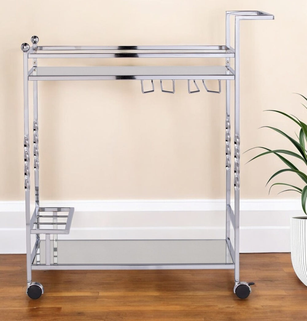 HomeRoots 29" Silver Metal Rolling Bar Cart with Mirrored Glass Shelves, Wine Storage & Smooth Mobility 402582