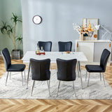 Hearth and Haven Table and Chair Set. 1 Table with 6 Black Leatherette Chairs.Rectangular Dining Table with White Imitation Marble Tabletop and Silver Metal Legs.Paired with 6 Chairs with Silver Legs.Dt-1544 C-008 W1151S00911
