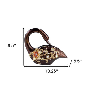 Homeroots 10" Bronze And Gold Polyresin Dove Statue Sculpture  Polyresin 468279