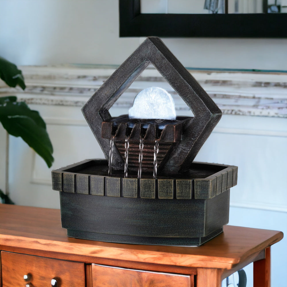 Homeroots 10" Brown Polyresin Geo And Pebbles Tabletop Fountain With Led Light  Polyresin 468310