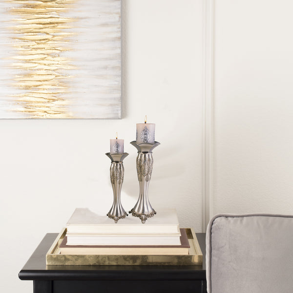 Homeroots Set Of Two Silver Metallic Polyresin Ornate Tabletop Pillar Candle Holders With Candle   468329