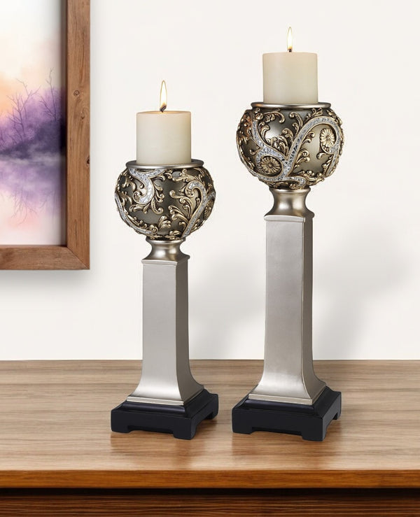 Homeroots Set Of Two Silver Polyresin Filigree Tabletop Pillar Candle Holders With Candle   468330