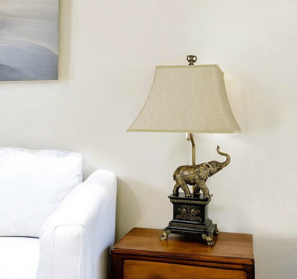 HomeRoots Antique Elephant Table Lamp - Elegant Hand-Finished Design with Gold Accents & Warm Beige Shade 468424