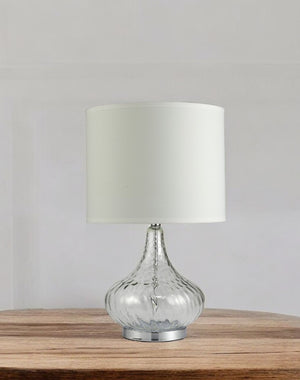 HomeRoots Clear Textured Glass Table Lamp – Elegant Modern Accent for Bedside or Living Room with Soft Glow Clear Glass and Chrome Silver 468499