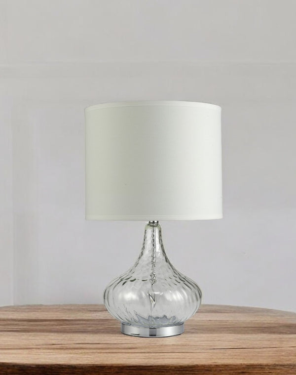 HomeRoots Clear Textured Glass Table Lamp – Elegant Modern Accent for Bedside or Living Room with Soft Glow Clear Glass and Chrome Silver 468499