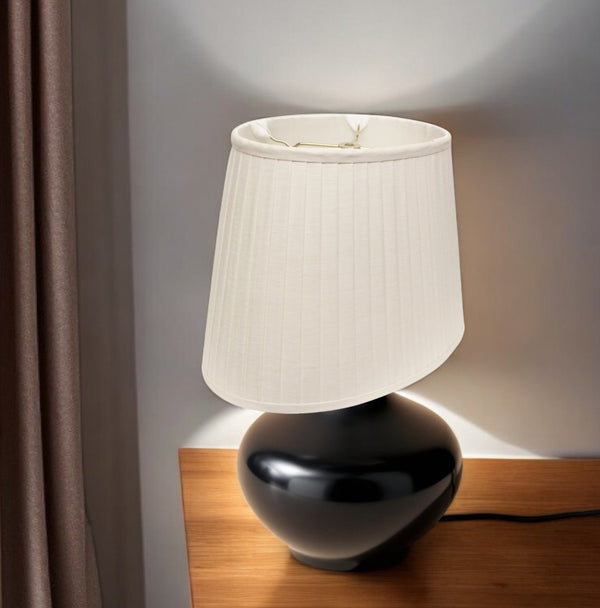 HomeRoots White Linen Pleated Oval Lamp Shade - Elegant Lighting for Timeless Interiors with Warm Glow & Style 469713