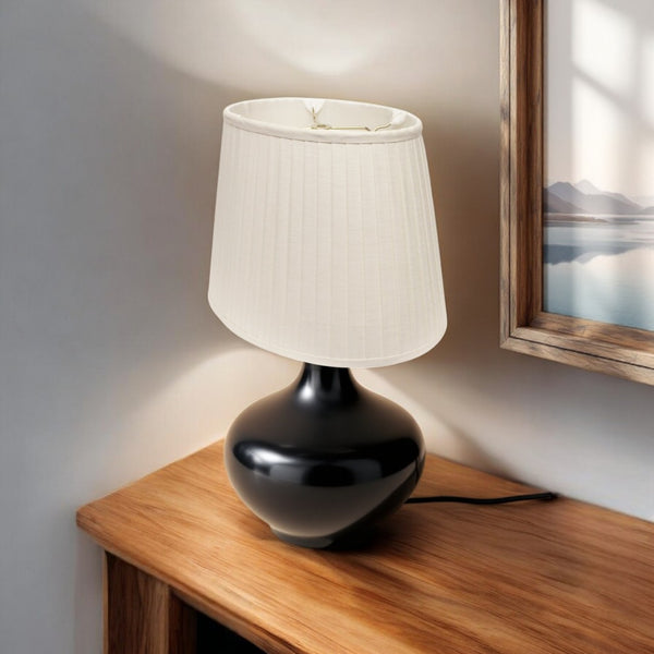 HomeRoots White Linen Pleated Oval Lamp Shade - Elegant Lighting for Timeless Home Decor & Warm Ambiance 469717