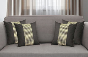 HomeRoots Set of Four 18" Black and Yellow Houndstooth Throw Pillows for Stylish Home Decor and Comfort 471891