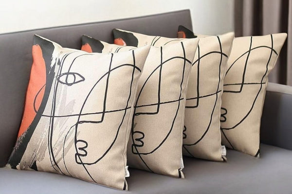 Homeroots Set Of Four 18" Ivory Black And Red Abstract Face Fabric Throw Pillows   471910