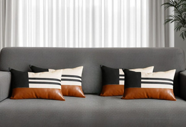 Homeroots Set Of Four 12" X 20" Brown Black And Ivory Striped Fabric And Faux Leather Lumbar Throw Pillows   471917