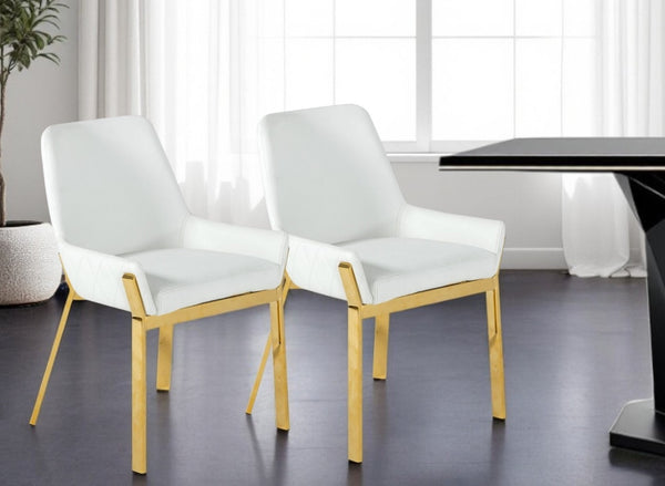 HomeRoots White Upholstered Faux Leather Dining Arm Chair with Gold Metal Legs - Modern Comfort & Style! 472186