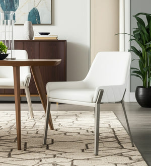 HomeRoots White Upholstered Faux Leather Dining Arm Chair - Modern Comfort with Silver Accents for Versatile Use 472187