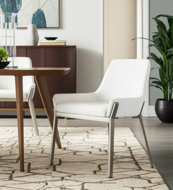 HomeRoots White Upholstered Faux Leather Dining Arm Chair - Modern Comfort with Silver Accents for Versatile Use 472187