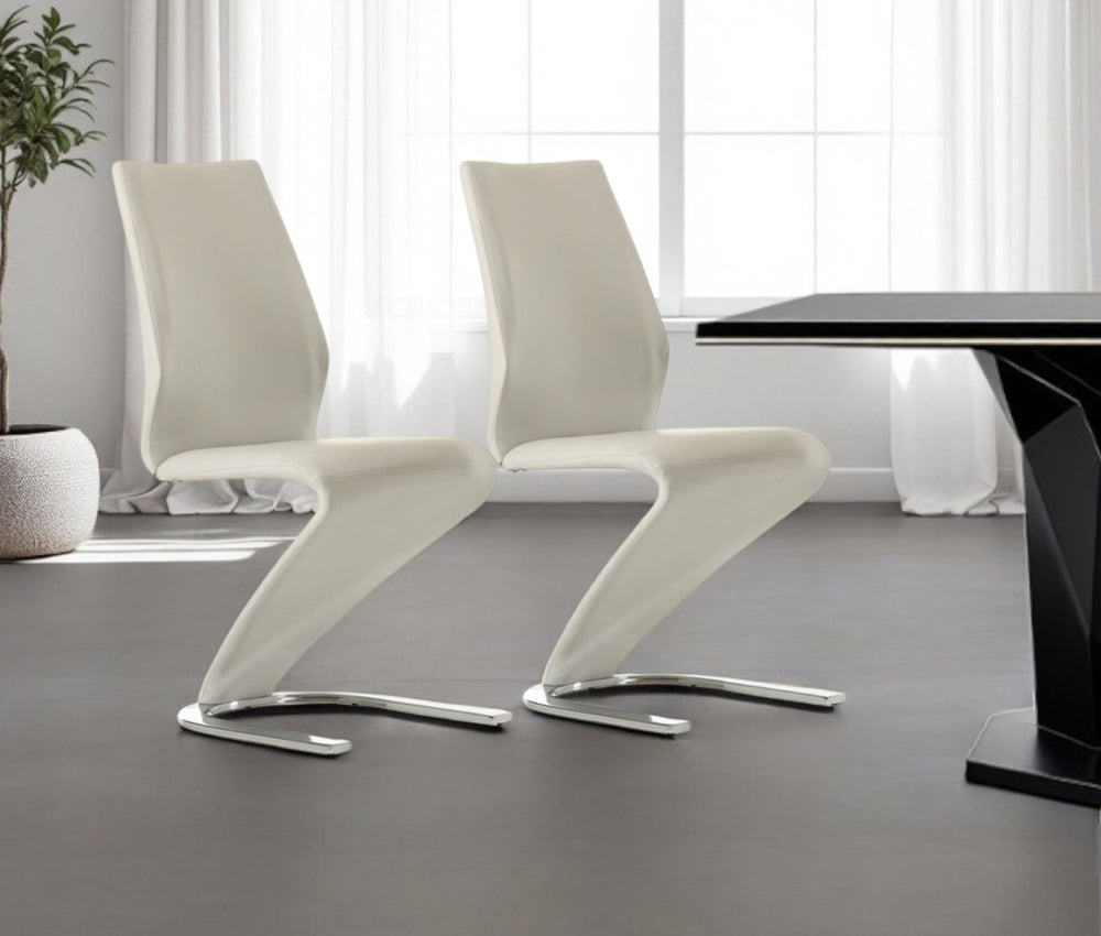 HomeRoots Set of Two Chic White and Silver Upholstered Faux Leather Dining Chairs for Versatile Spaces 472191