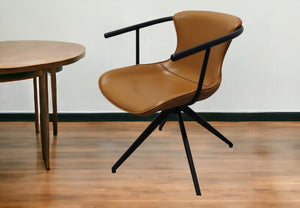 Homeroots Camel And Black Upholstered Faux Leather Dining Arm Chair  Metal 472229