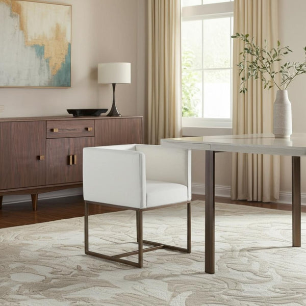 HomeRoots Off White Upholstered Fabric Dining Arm Chair with Antiqued Brass Legs – Elegant, Versatile Comfort 472247