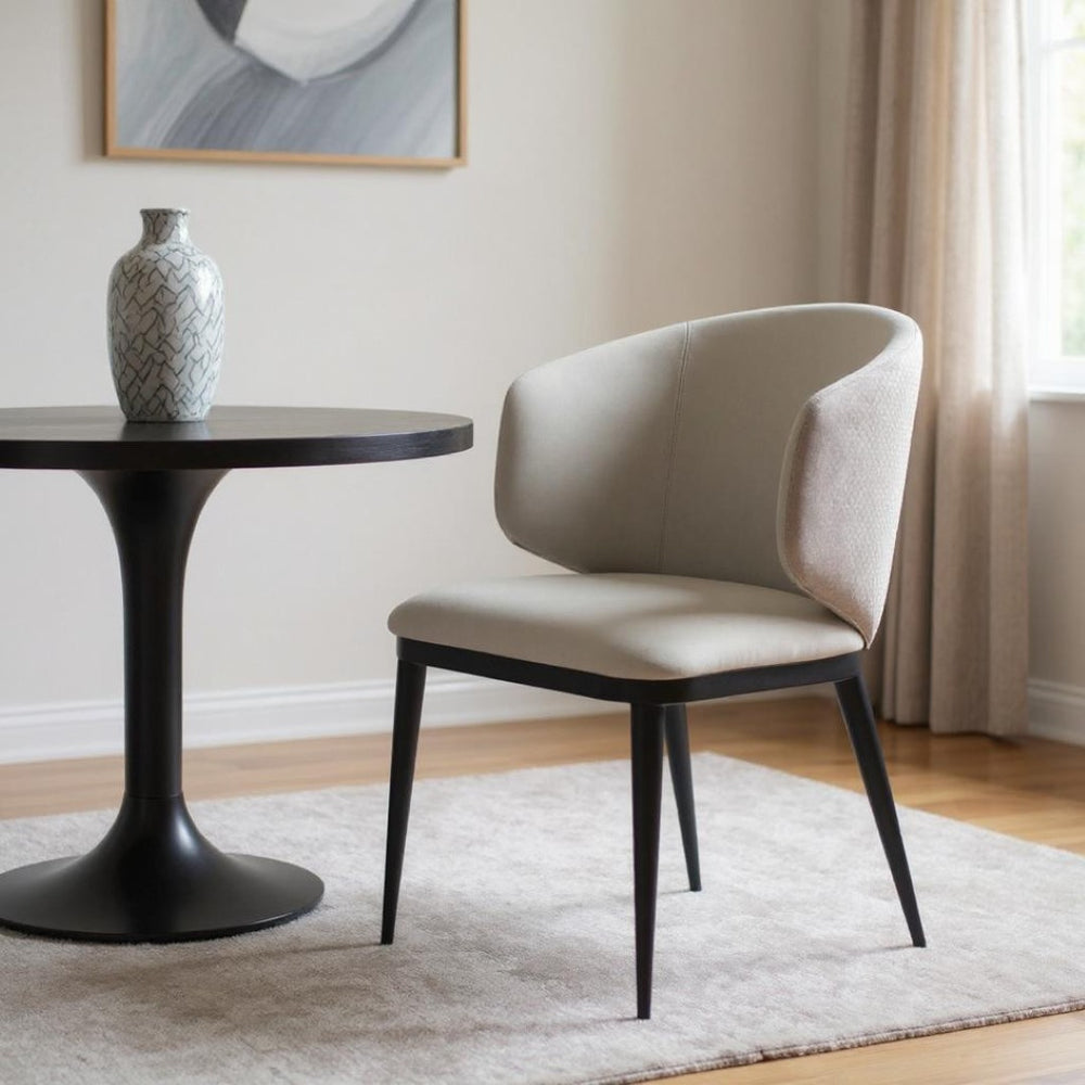 HomeRoots Beige Wing Back Dining Arm Chair - Stylish Faux Leather Upholstery with Black Metal Frame, Versatile Design 472255