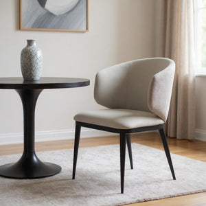 HomeRoots Beige Wing Back Dining Arm Chair - Stylish Faux Leather Upholstery with Black Metal Frame, Versatile Design 472255