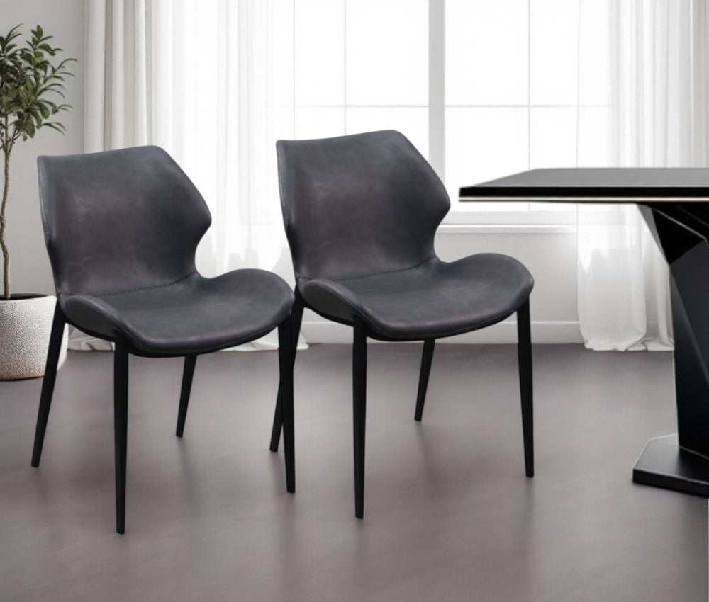 HomeRoots Set of Two Contemporary Gray Faux Leather Wing Back Dining Chairs with Black Metal Legs 472256