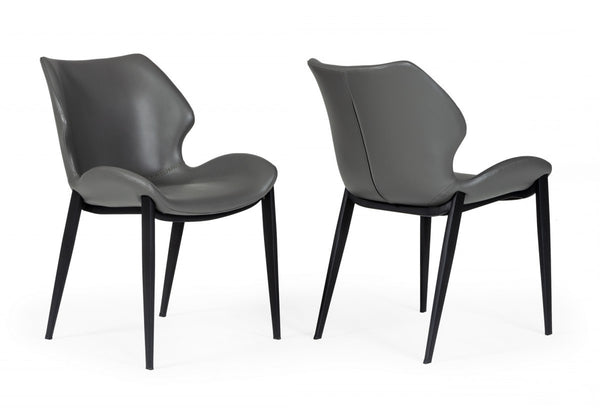 Homeroots Set Of Two Gray Faux Leather Industrial Dining Chairs  Metal And Wood 472262