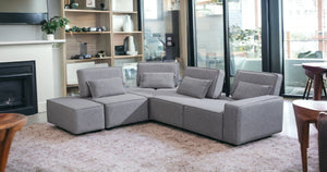 HomeRoots Light Gray Modular L-Shaped Sectional Sofa Set with Ottoman & Toss Pillows for Modern Living Spaces 473570