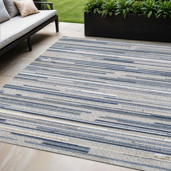 HomeRoots 5' Refreshing Blue Abstract Area Rug - Stain Resistant, Durable & Versatile for Indoor and Outdoor Spaces 5' X 7' Rectangle 473661