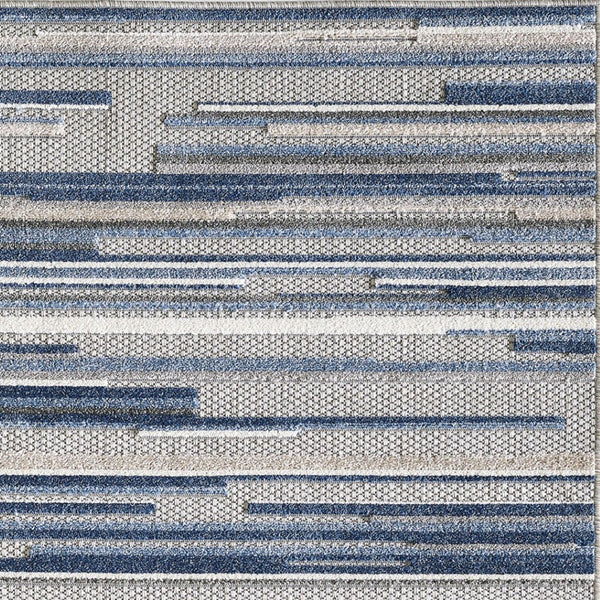 HomeRoots 5' Refreshing Blue Abstract Area Rug - Stain Resistant, Durable & Versatile for Indoor and Outdoor Spaces 5' X 7' Rectangle 473661