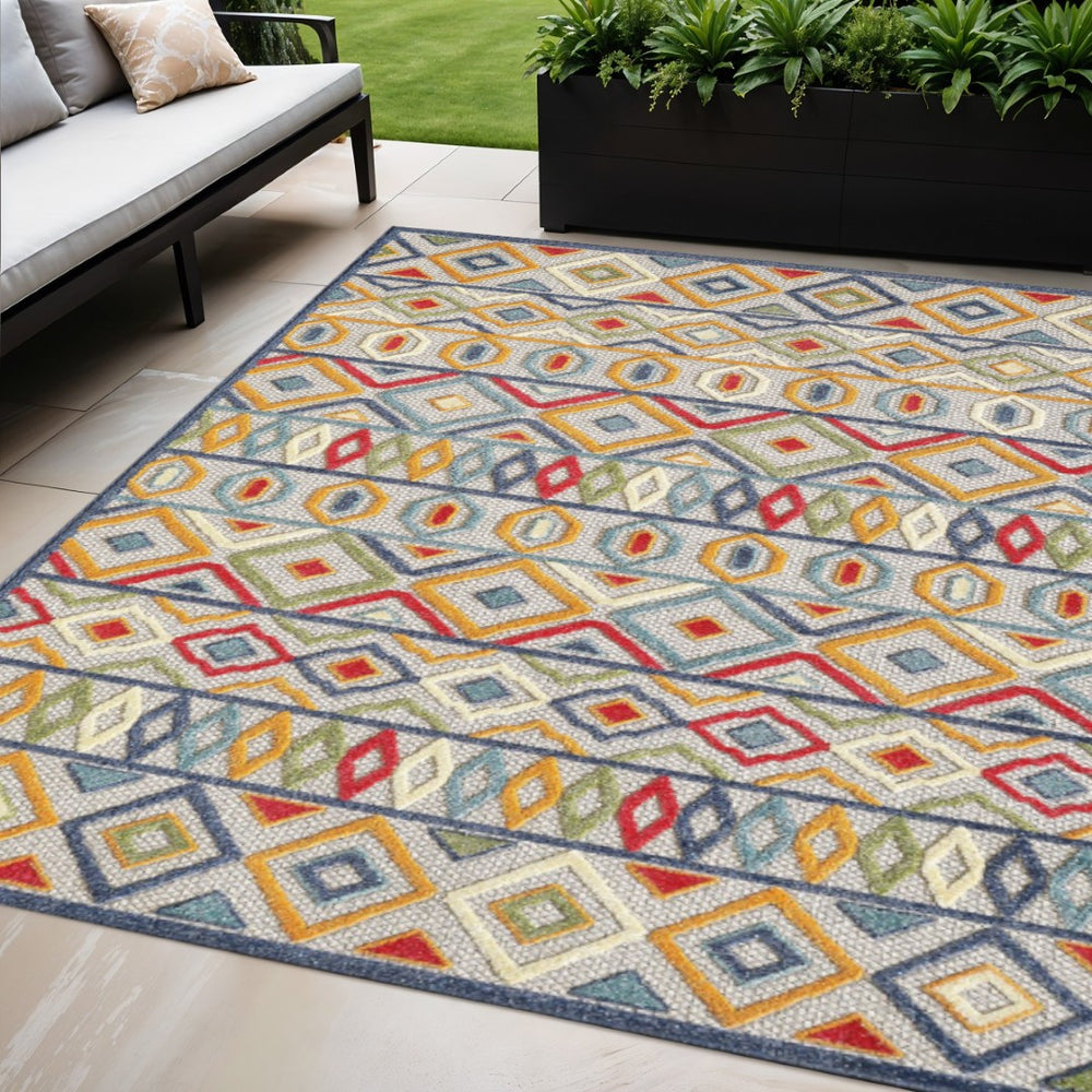 HomeRoots 5' Durable Ivory and Blue Southwestern Area Rug – Stain-Resistant, UV Protected for Indoor/Outdoor Use 5' X 7' Rectangle 473703