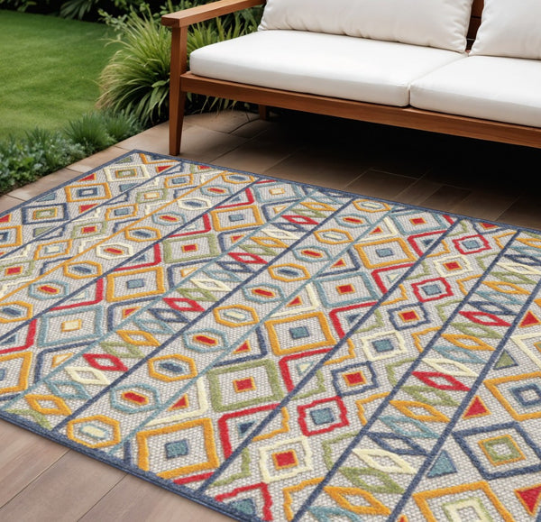 HomeRoots 5' Durable Ivory and Blue Southwestern Area Rug – Stain-Resistant, UV Protected for Indoor/Outdoor Use 8' X 10' Rectangle 473706