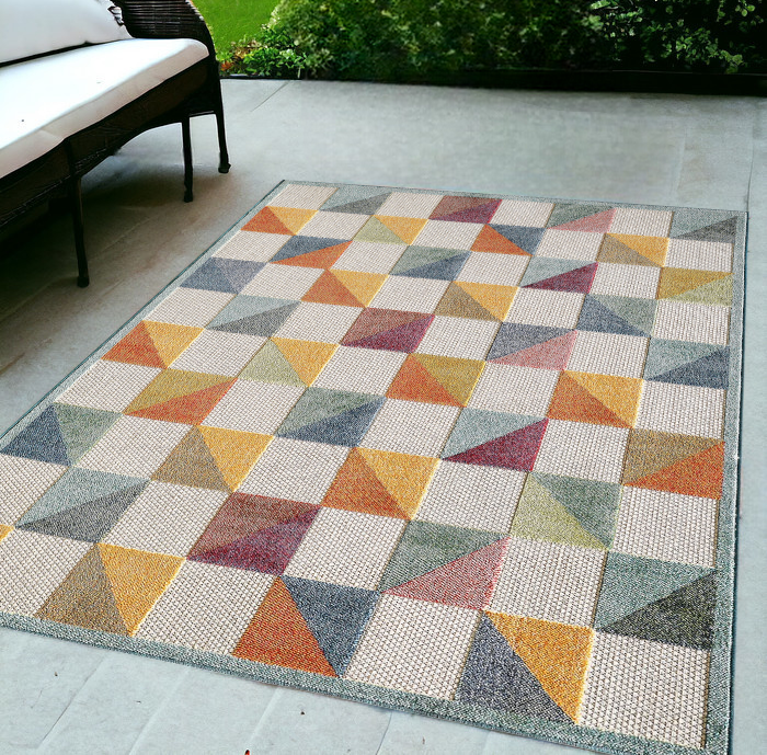 Homeroots 5' X 7' Orange And Ivory Geometric Stain Resistant Indoor Outdoor Area Rug  Uv,Treated Polypropylene 473715