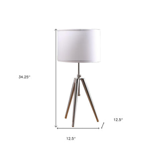 HomeRoots 34" Adjustable Silver Metal Tripod Table Lamp with White Shade - Modern Design for Any Space 473738
