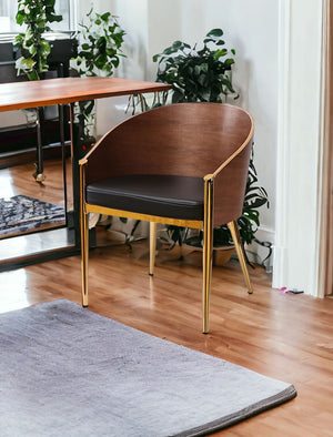 Homeroots 28" Modern Walnut Black And Gold Stylish Faux Leather Accent Chair   473846