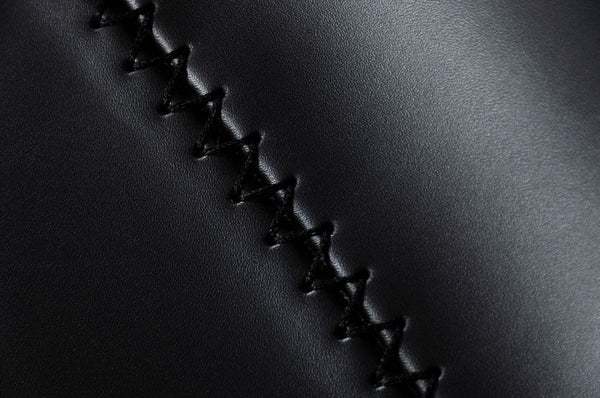 Homeroots Set Of Two 30" Black And Silver Faux Leather And Steel Low Back Bar Height Bar Chairs   473876